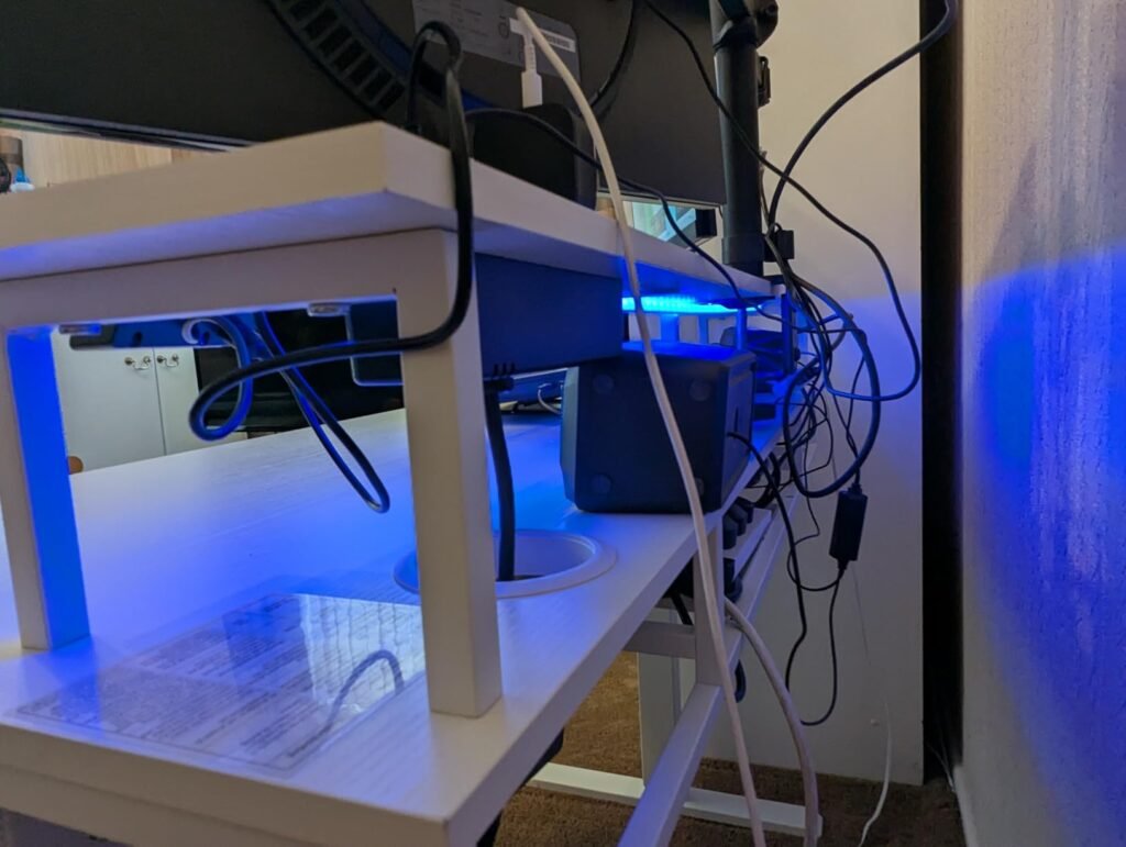 view of our own new purchase testing offigo desk with cable management tray unboxing package arrival several weeks to months 