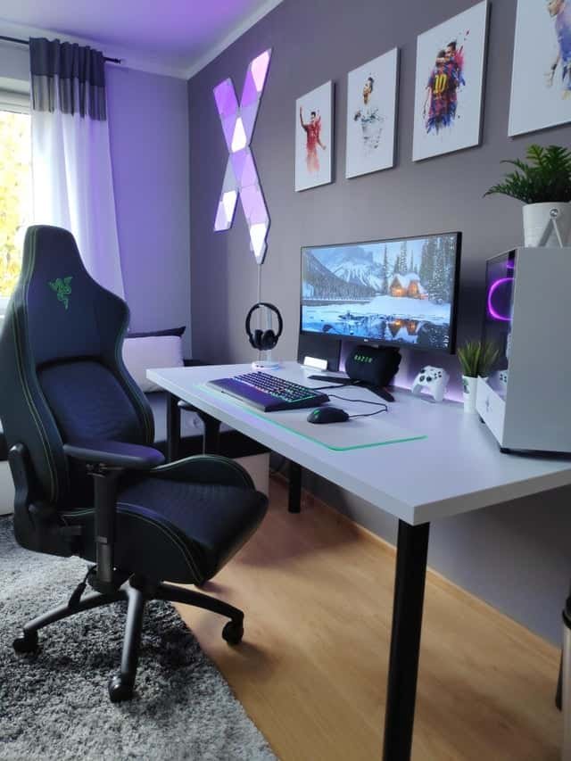 gaming room setup with a white top desk