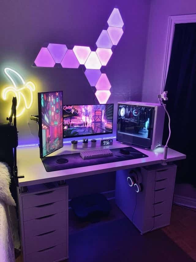 purple gaming setup with tilted monitor